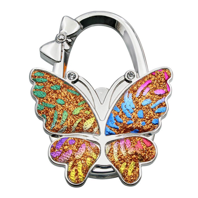 Gancio pieghevole a forma di farfalla per borse – Elegante gancio portatile antiscivolo per bors