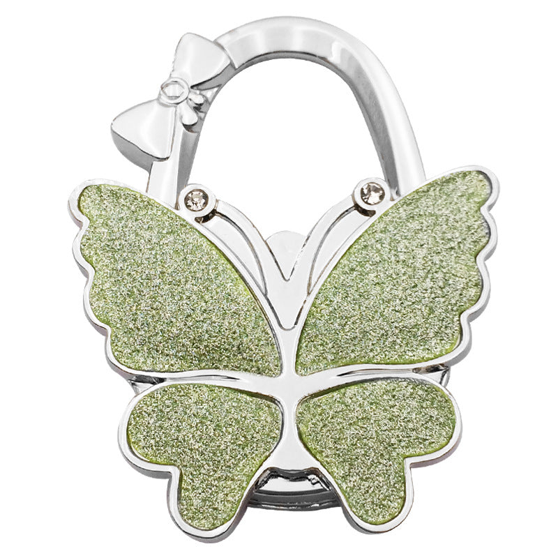 Gancio pieghevole a forma di farfalla per borse – Elegante gancio portatile antiscivolo per bors