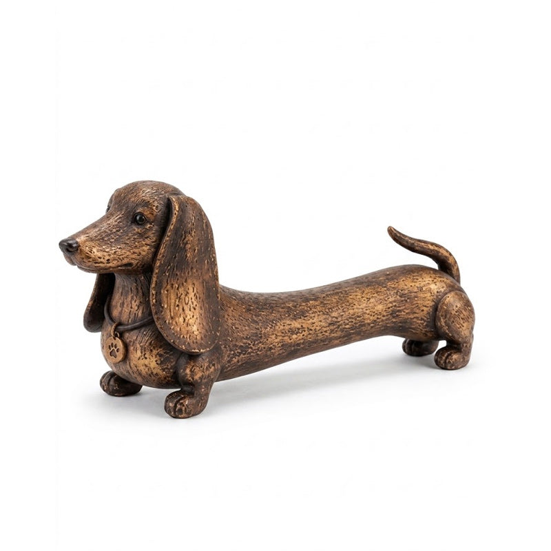 Statuetta decorativa in legno a forma di bassotto