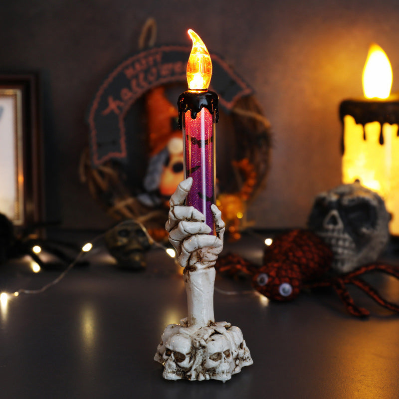 Decorazione a LED a forma di candela con una mano da fantasma per Hallowee