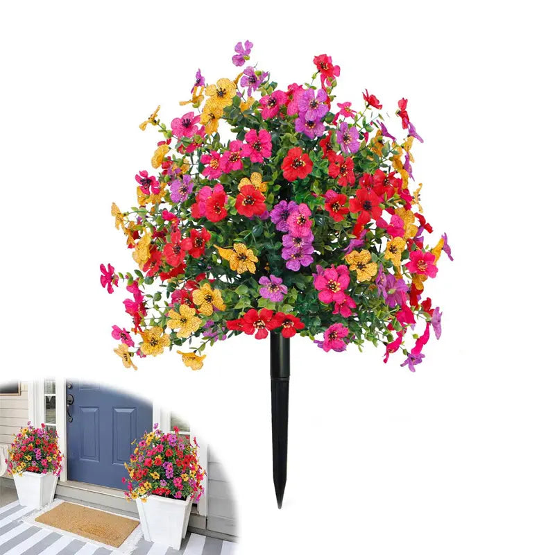 Composizione floreale con eucalipto artificiale e violette in vaso
